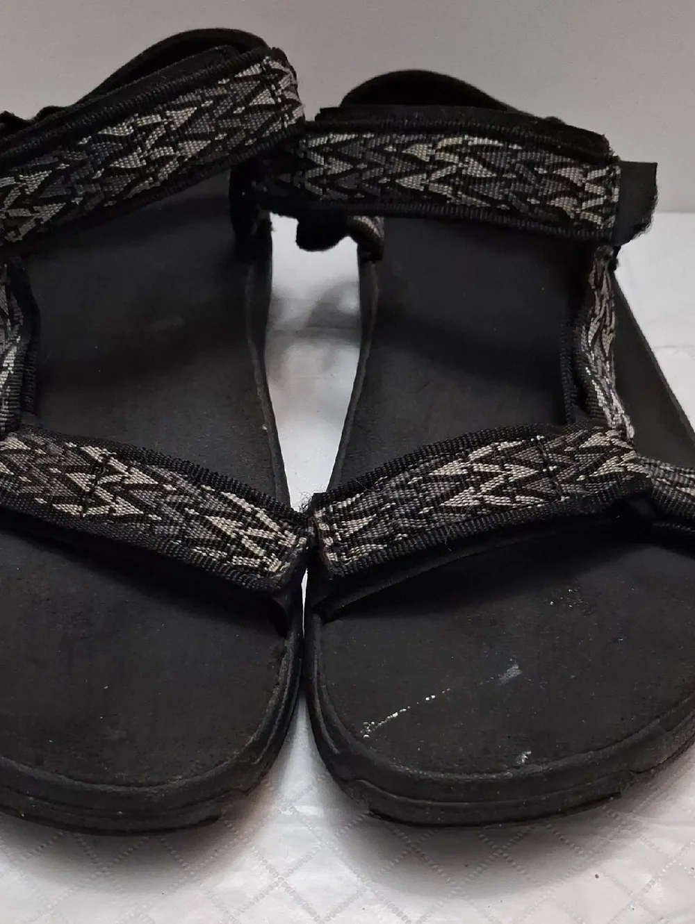 Teva Size 10 men's sandal in black, gray strap with velcro adjustable strap.